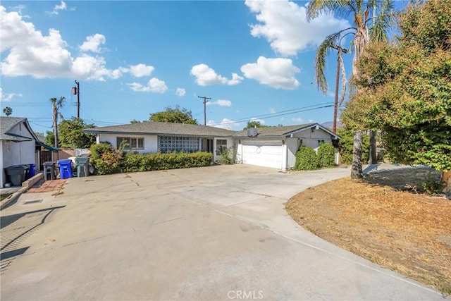 single story home with a garage