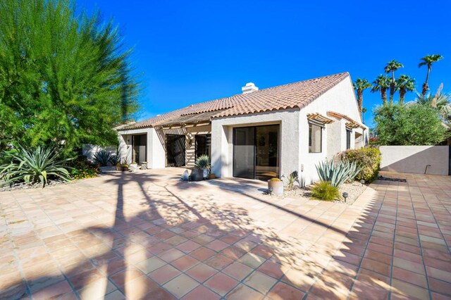 rear view of property with a patio