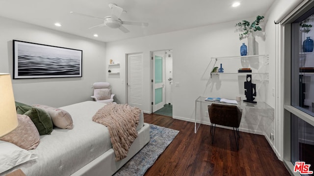 bedroom featuring ceiling fan and dark wood-type flooring