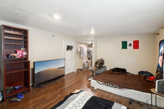 bedroom with hardwood / wood-style flooring