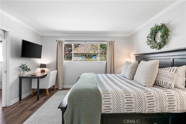 bedroom with crown molding and dark wood-type flooring