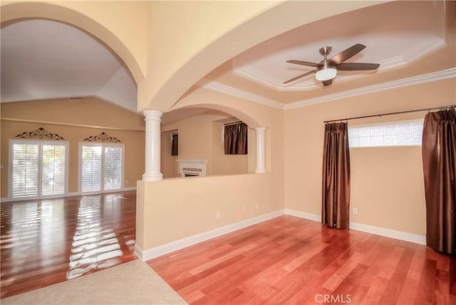 spare room with hardwood / wood-style flooring, ceiling fan, and ornamental molding