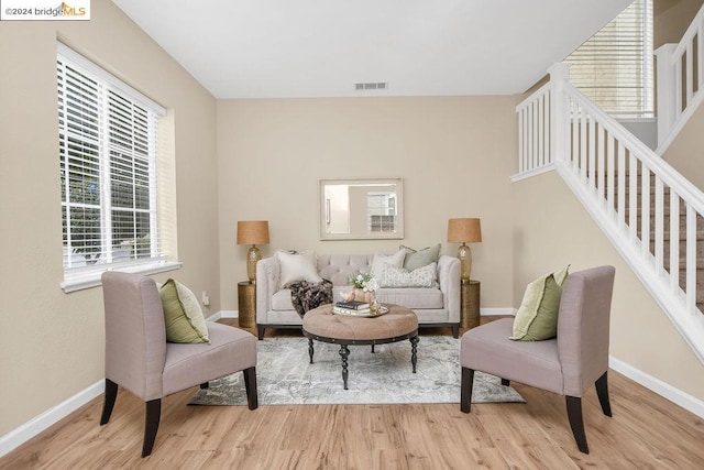 sitting room with light hardwood / wood-style flooring