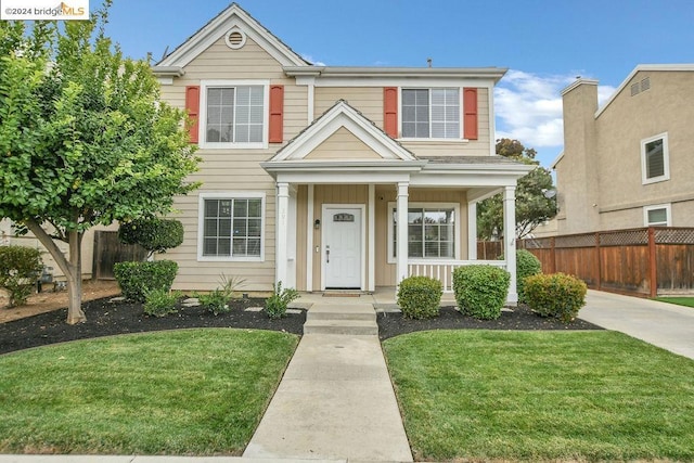 view of front of property with a front lawn