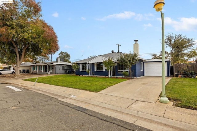 single story home with a garage and a front yard