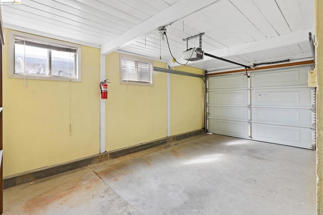 garage featuring a garage door opener