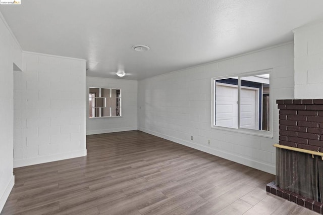 unfurnished living room featuring wood-type flooring