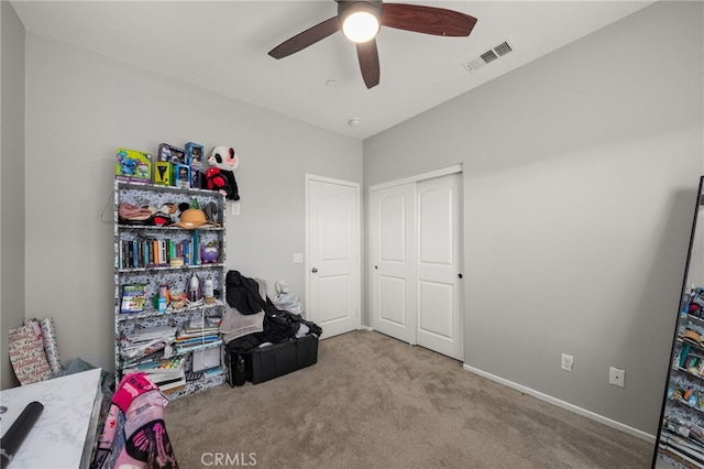 playroom featuring carpet flooring, ceiling fan, and lofted ceiling