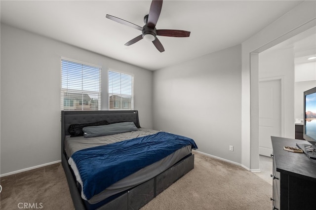 bedroom with ceiling fan and carpet floors