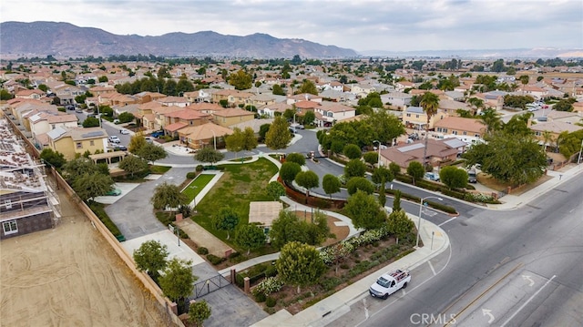 drone / aerial view featuring a mountain view