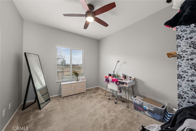 misc room with light carpet and ceiling fan