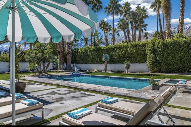 view of pool featuring a patio