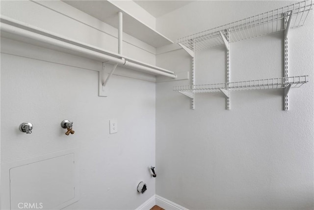 washroom featuring hookup for a washing machine and hookup for a gas dryer