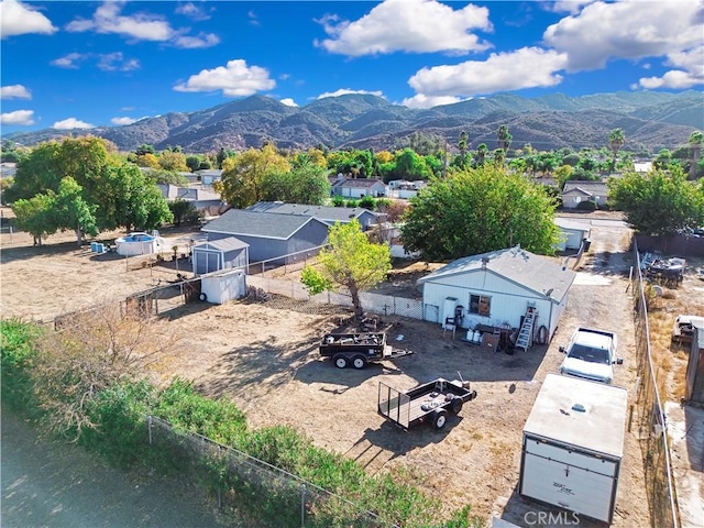 drone / aerial view featuring a mountain view