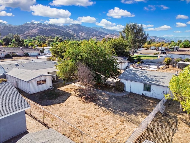 drone / aerial view featuring a mountain view