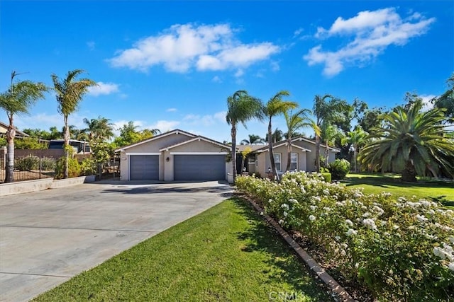 ranch-style home featuring a garage and a front yard