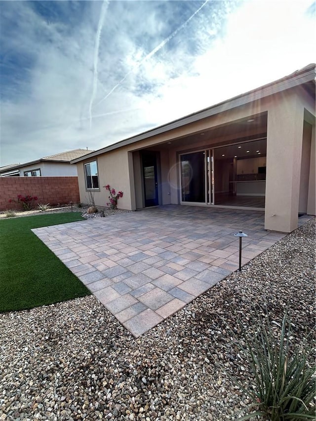 back of house featuring a patio