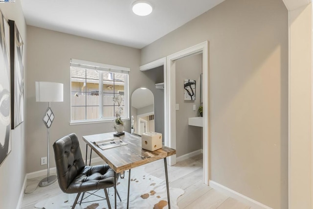 home office featuring light wood-type flooring