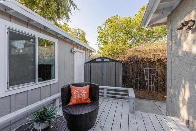 deck with a storage shed