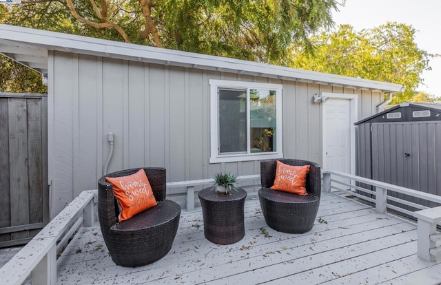 deck featuring a storage shed