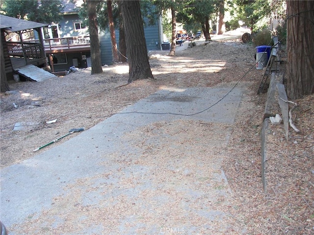 view of yard featuring a wooden deck