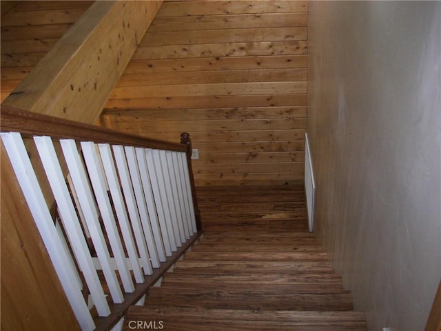 staircase featuring hardwood / wood-style flooring