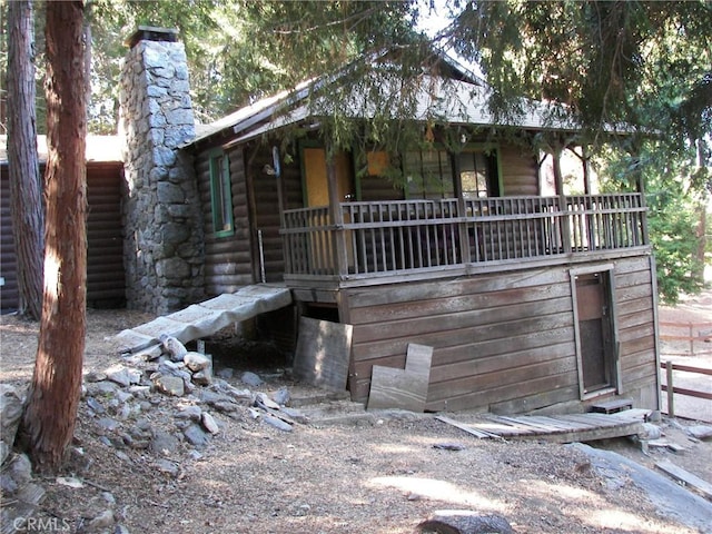 view of log-style house