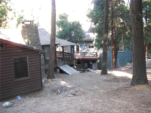 view of yard featuring a deck