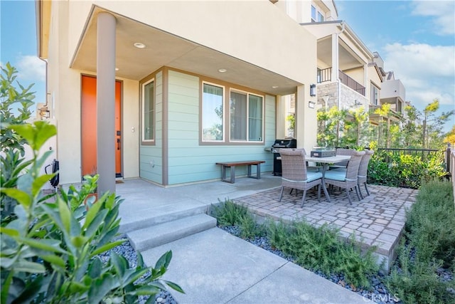 view of patio with a grill