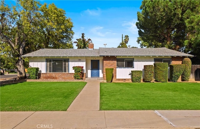 ranch-style home with a front yard