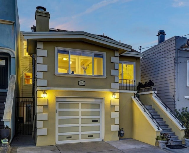 view of front of home with a garage