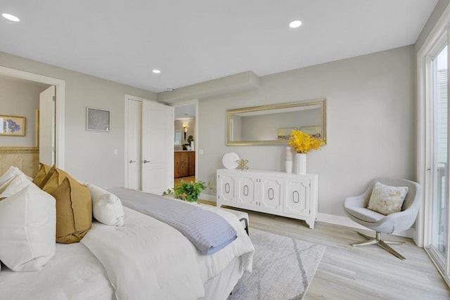 bedroom featuring light hardwood / wood-style flooring