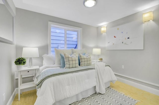 bedroom featuring light wood-type flooring