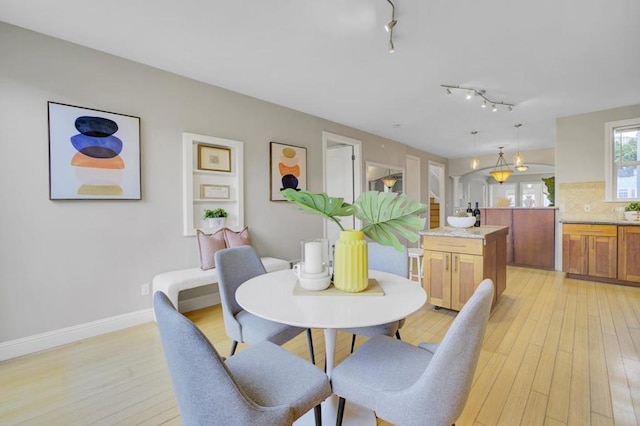 dining area featuring light hardwood / wood-style floors