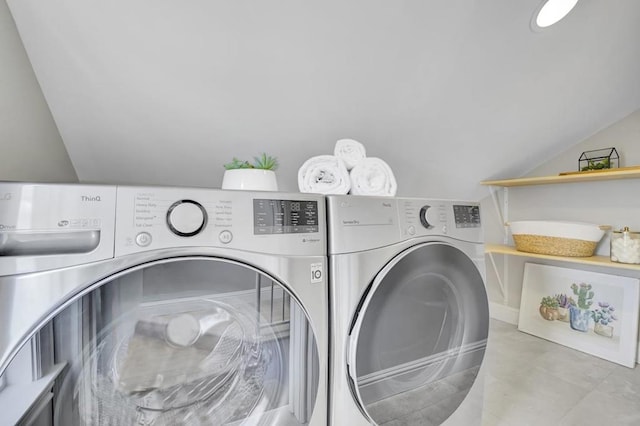 washroom featuring independent washer and dryer