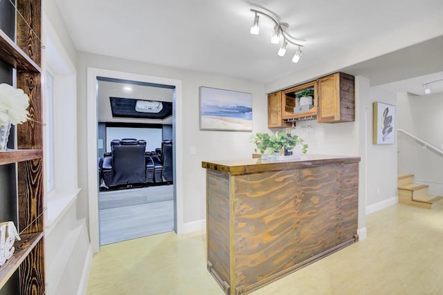 bar with light wood-type flooring