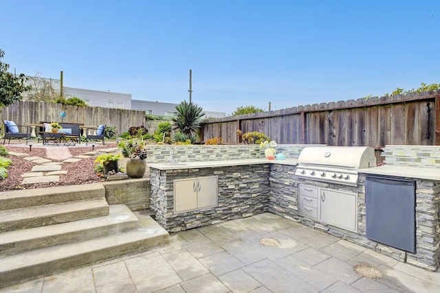 view of patio / terrace with area for grilling