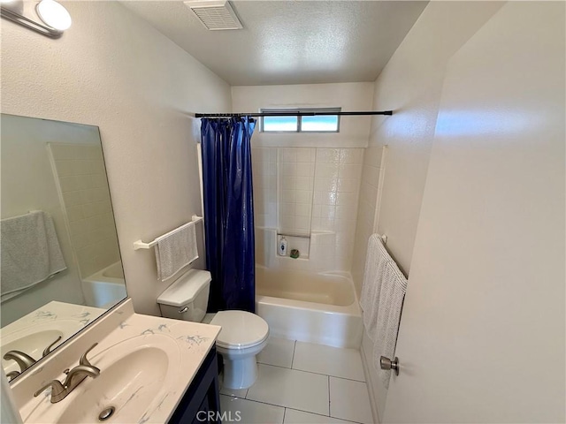 full bathroom with shower / bathtub combination with curtain, tile patterned flooring, a textured ceiling, toilet, and vanity