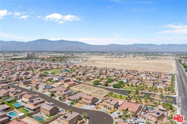 bird's eye view with a mountain view