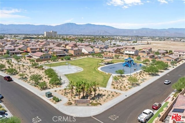 drone / aerial view featuring a mountain view