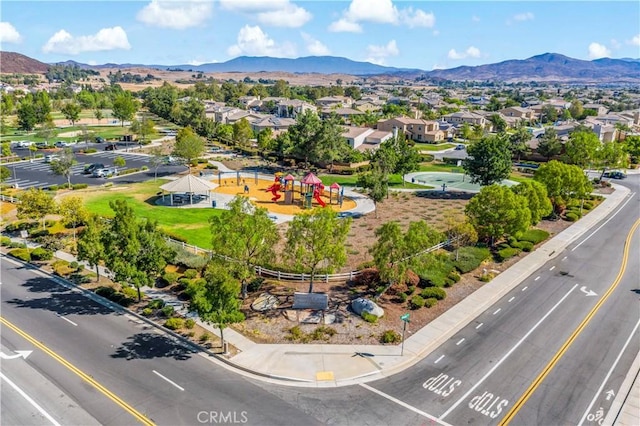 drone / aerial view with a residential view and a mountain view