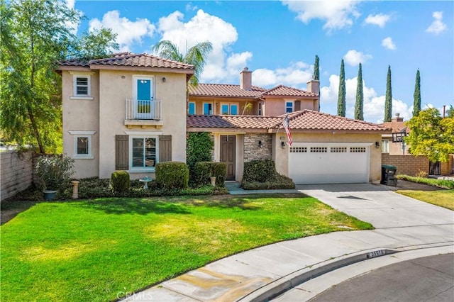 mediterranean / spanish house with a garage, a tiled roof, concrete driveway, and stucco siding