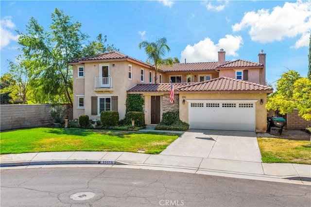 mediterranean / spanish house featuring a garage, fence, driveway, stucco siding, and a front yard