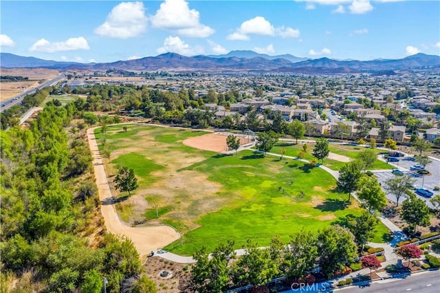 birds eye view of property with a residential view and a mountain view