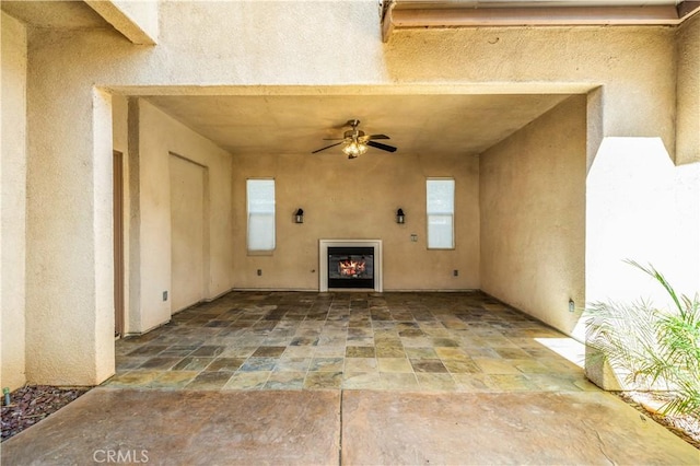 view of patio / terrace with ceiling fan