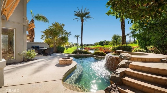 view of swimming pool with a patio