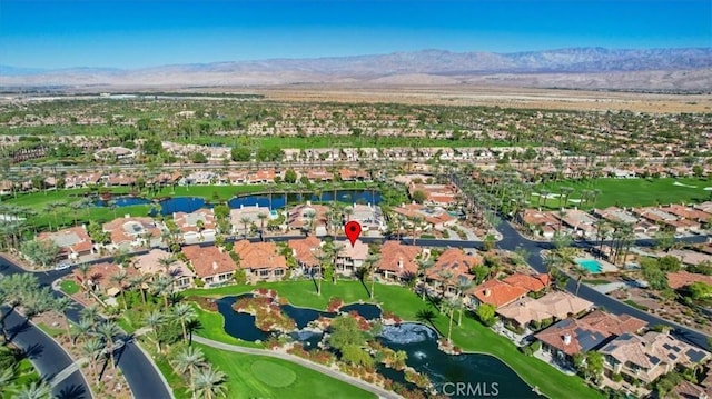 aerial view with a water and mountain view