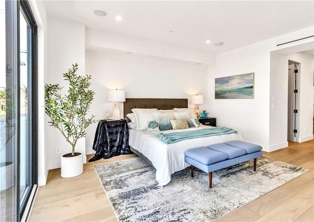 bedroom featuring light hardwood / wood-style floors