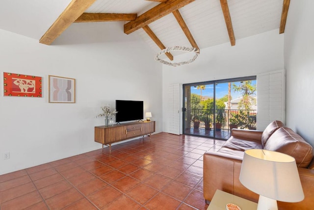 tiled living room with beamed ceiling and high vaulted ceiling