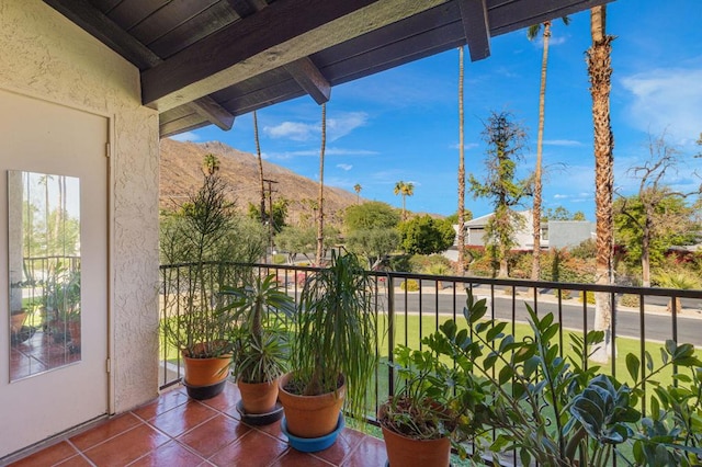 balcony featuring a mountain view